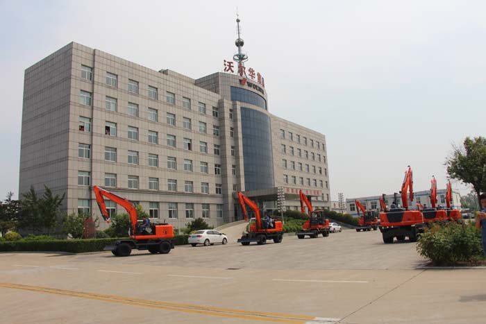 熱烈祝賀沃爾華集團(tuán) 60臺(tái)輪式挖掘機(jī)批量出口泰國